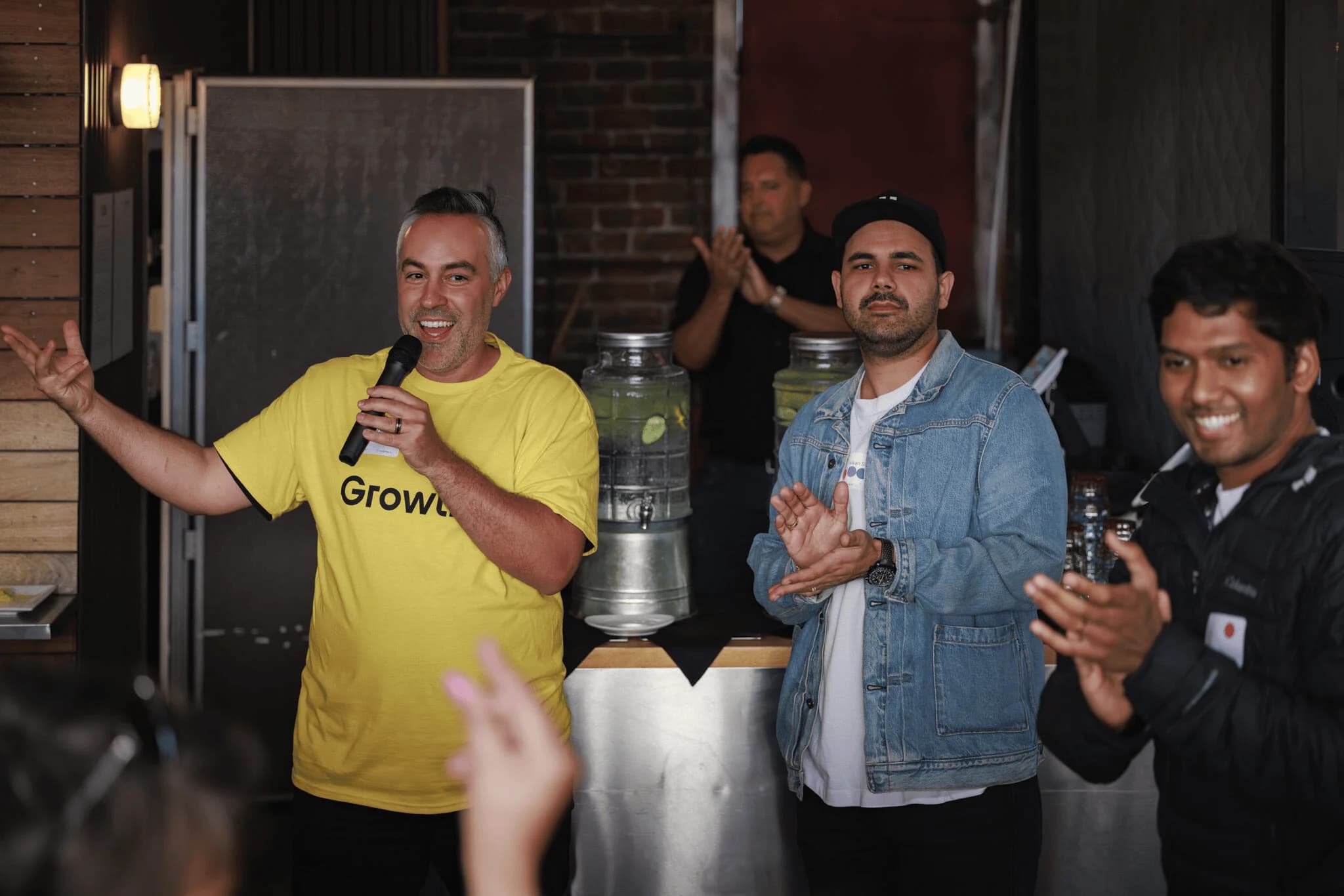 Members talking at an AI-Led Growth event